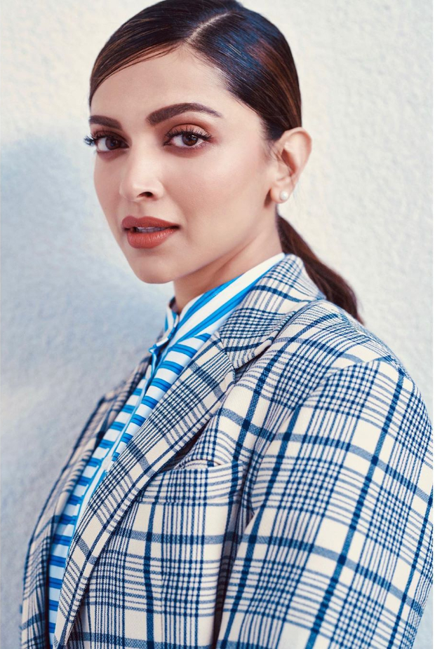 Deepika showing her professional look in blue check suit with Side partition Pony - deepika padukone hairstyles 2021