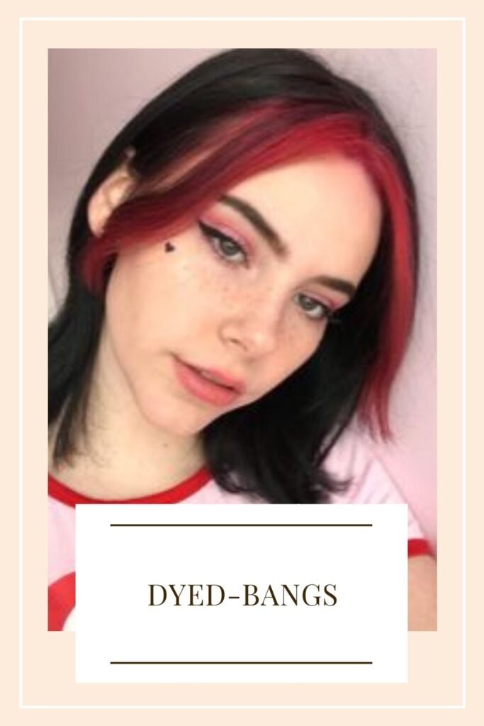 A girl is posing for a selfie with her Dyed-Bangs - Hair color ideas for brunettes