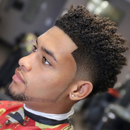 A guy is giving side pose and showing his Short Fro + Line Up + Neck Taper - boys latest hairstyle 2021