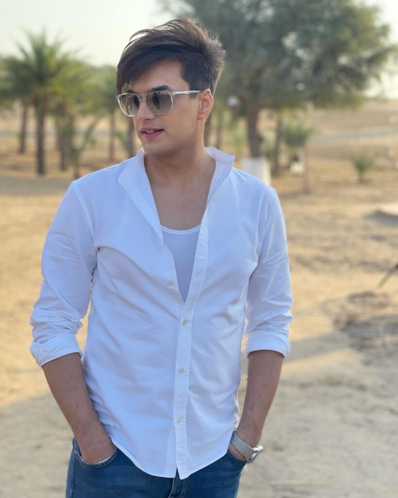 Mohsin Khan wearing white shirt and goggles giving a side pose to camera - most handsome actors all the time