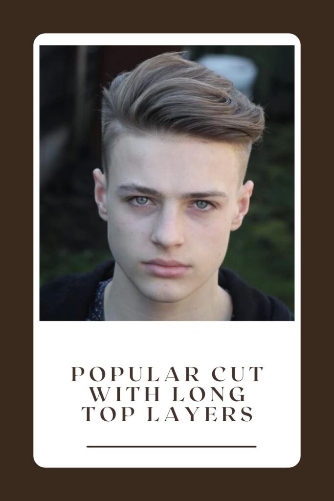 A boy is showing his Popular Cut with Long Top Layers hairstyles - 16 years old boy haircuts