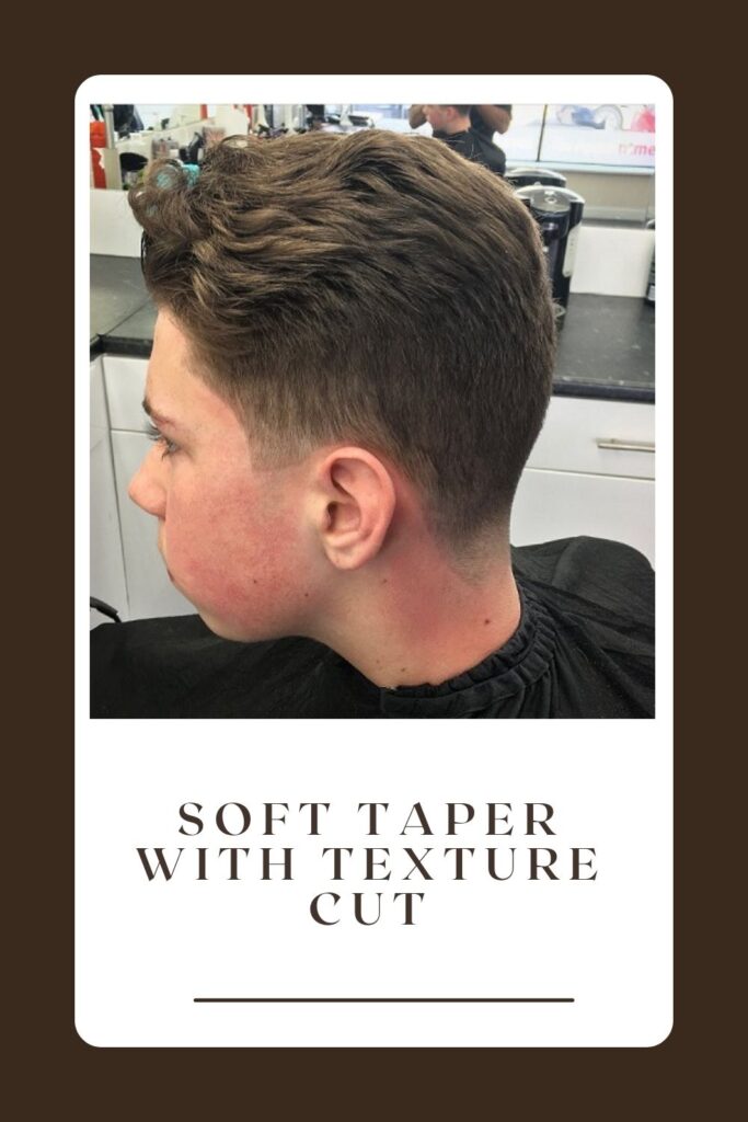A boy is showing side look of his Soft Taper with Texture Cut - 14 years old boy haircuts 2021