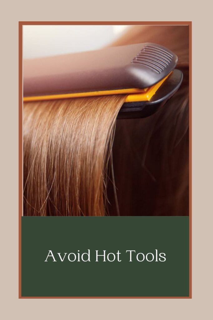 A girl is using hot iron to her brown hair - best hair care routine for hair growth