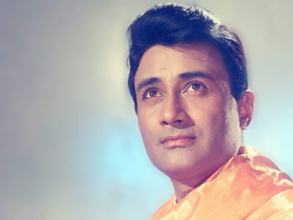 Dev Anand in golden shirt posing for camera - all time most handsome actor in India

