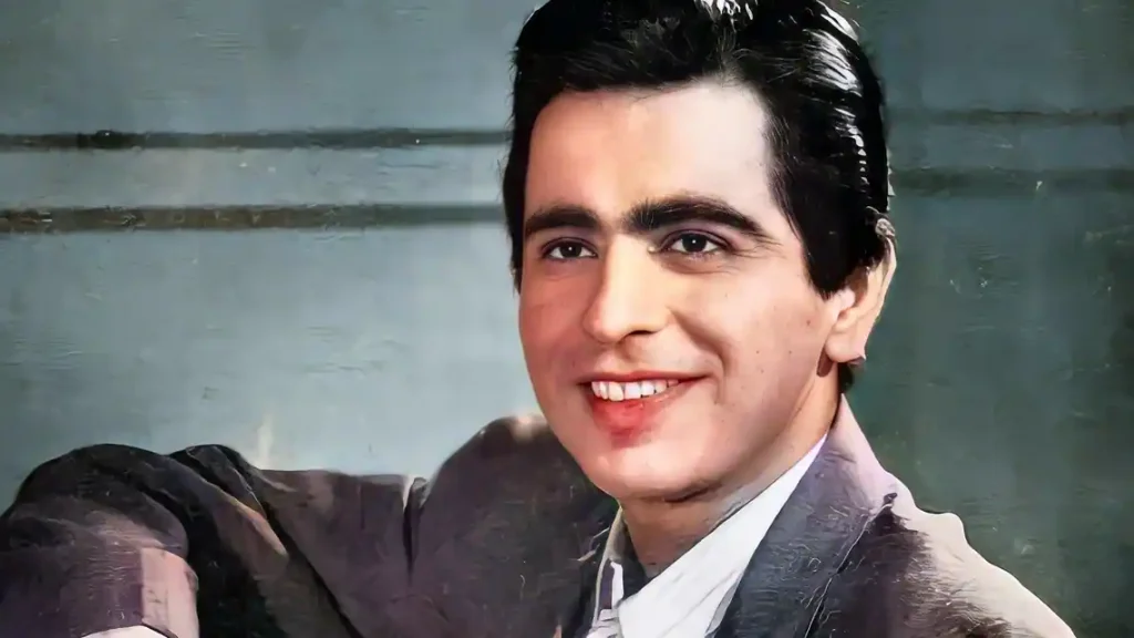 Smiling Dilip Kumar posing for camera - hottest man in India