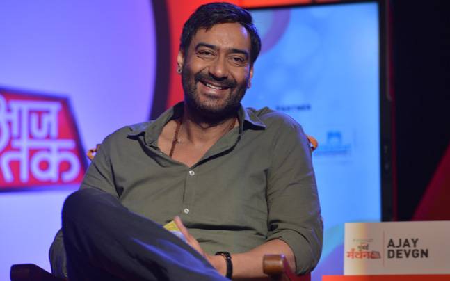 Smiling Ajay Devgn posing for camera in without makeup look - celebrities without makeup