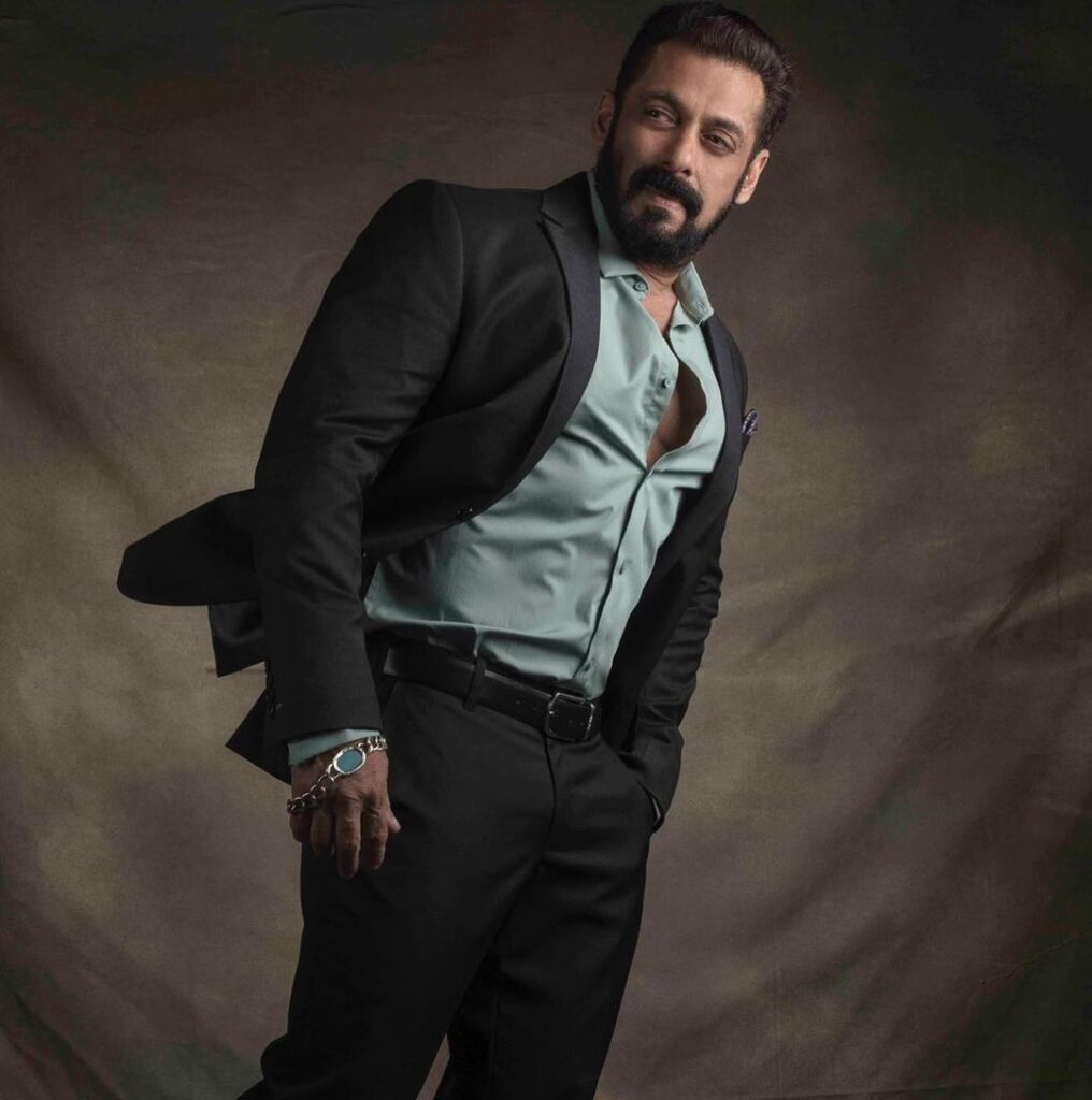 Salman Khan in Black suit posing for camera - Bollywood Short Actors