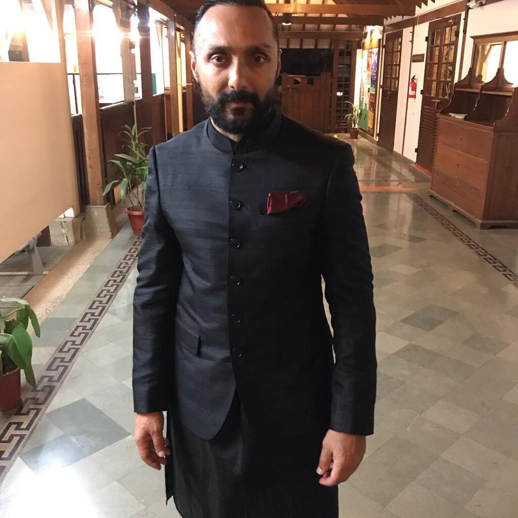 Rahul Bose in Black kurta and Blue jacket posing for camera  -short actors