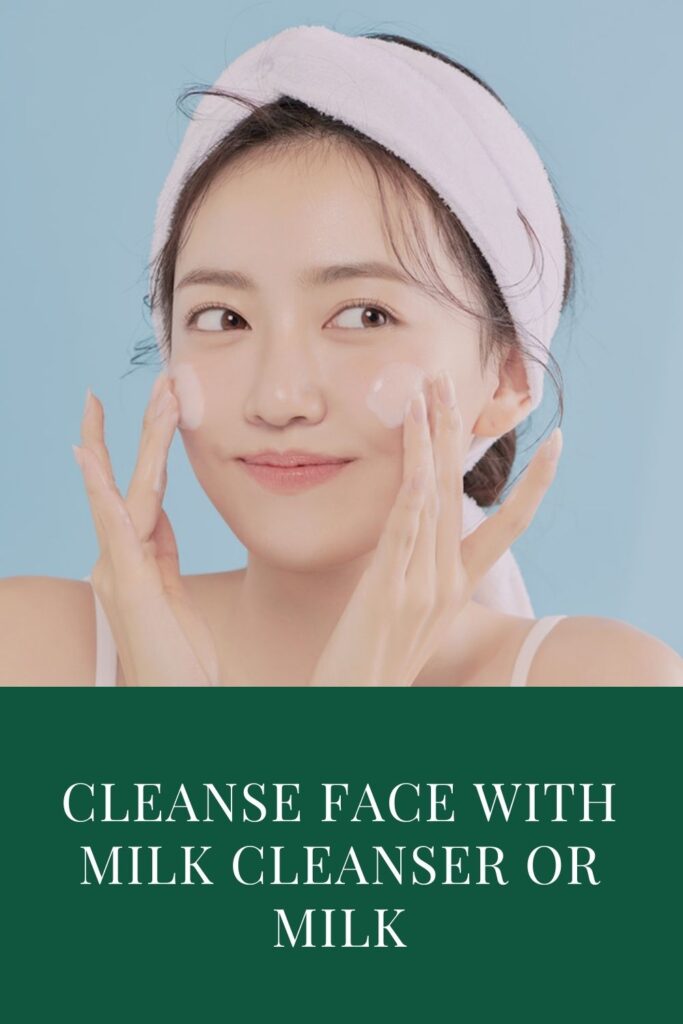 A girl is cleaning her face with milk cleanser  - night skin care