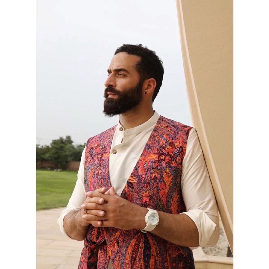 Rouhallah Gazi in white kurta with multicolor half jacket - top models in India