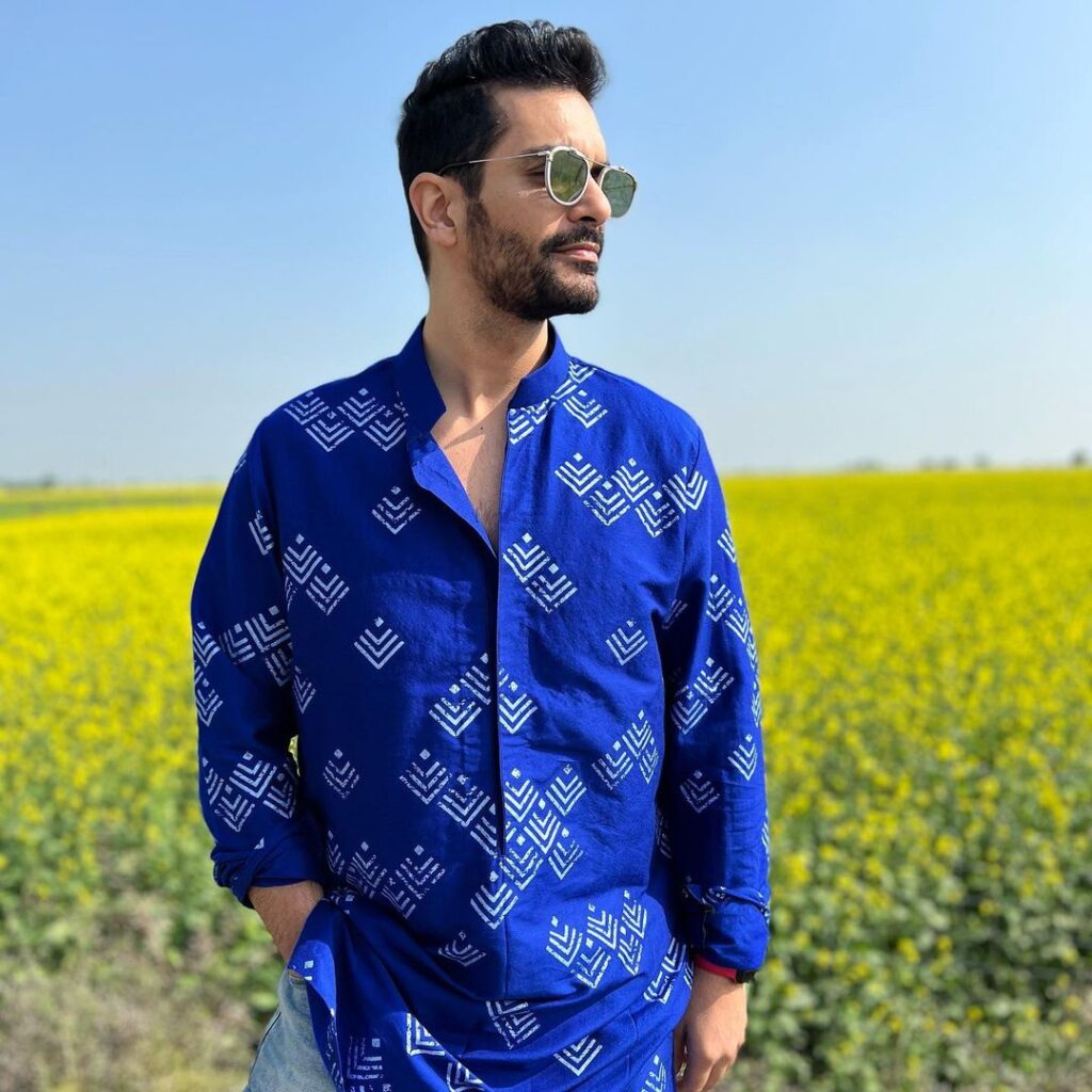 Angad Bedi in blue and white posing for camera - male models in India 2022