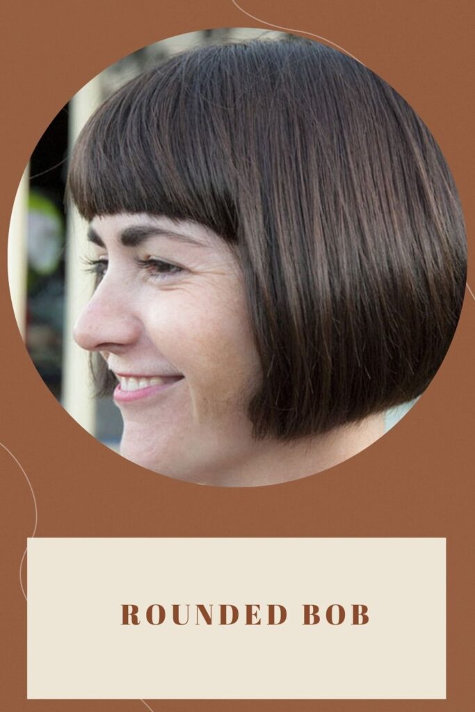 A Smiling girl is showing her Rounded Bob hairstyle A Smiling girl is showing her Rounded Bob hairstyle - haircuts for round faces and thin hair