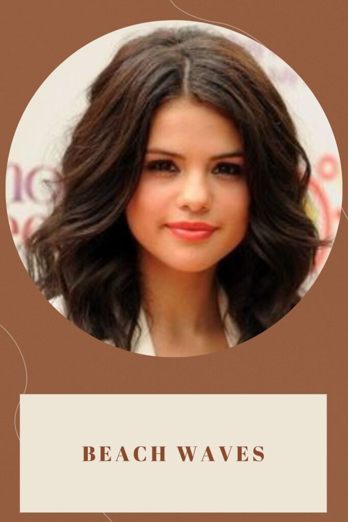 Selena Gomez showing her beautiful beach waves hairstyle - haircuts for round face Indian
