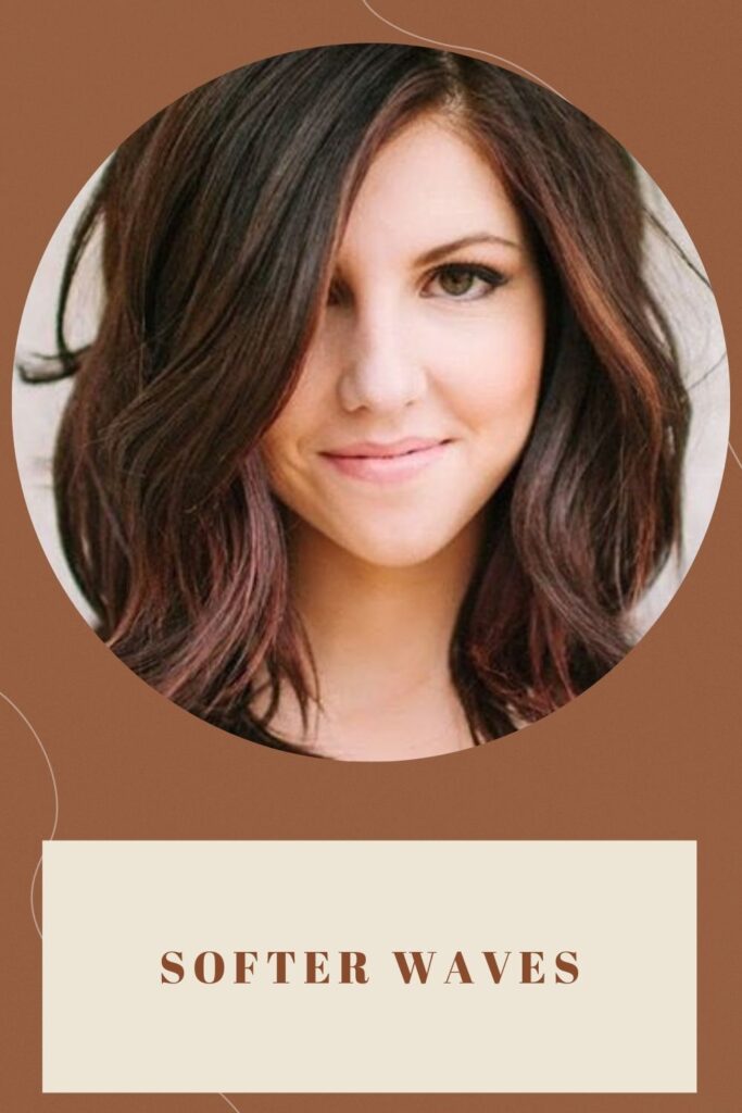 A girl is showing her softer waves hairstyle A girl is showing her softer waves hairstyle - haircut for round face long hair