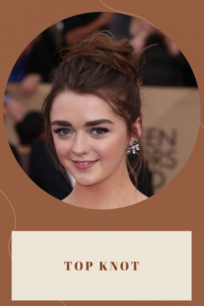 A smiling girl is showing her top knot hairstyle A smiling girl is showing her top knot hairstyle - haircuts for round faces and thin hair
