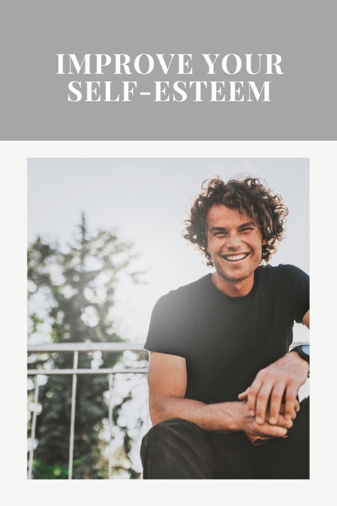 A smiling man sitting and posing for camera - Enhance Self-Esteem