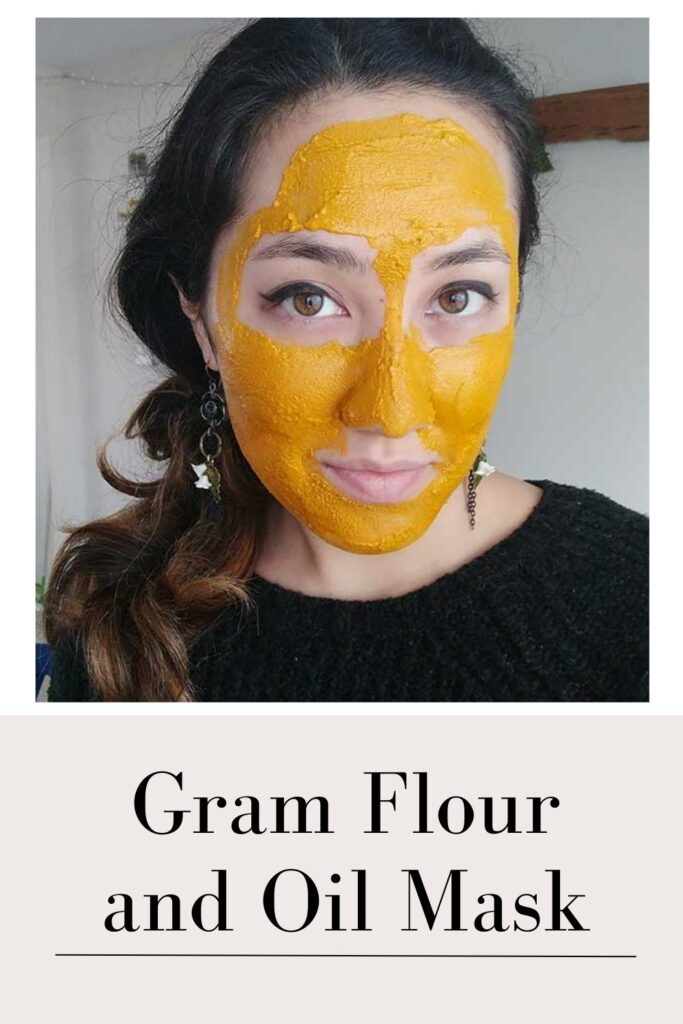 A women in black top applying gram flour and oil face mask - oily skin