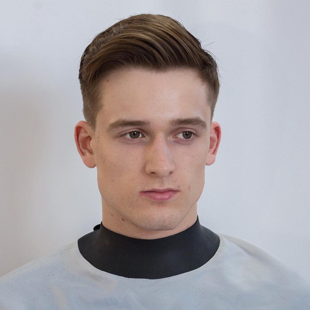 A boy showing his Classic Side Part Short Hairstyle - short hairstyles for boys