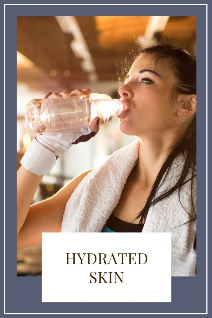A girl is drinking water with bottle - Working Out Affects