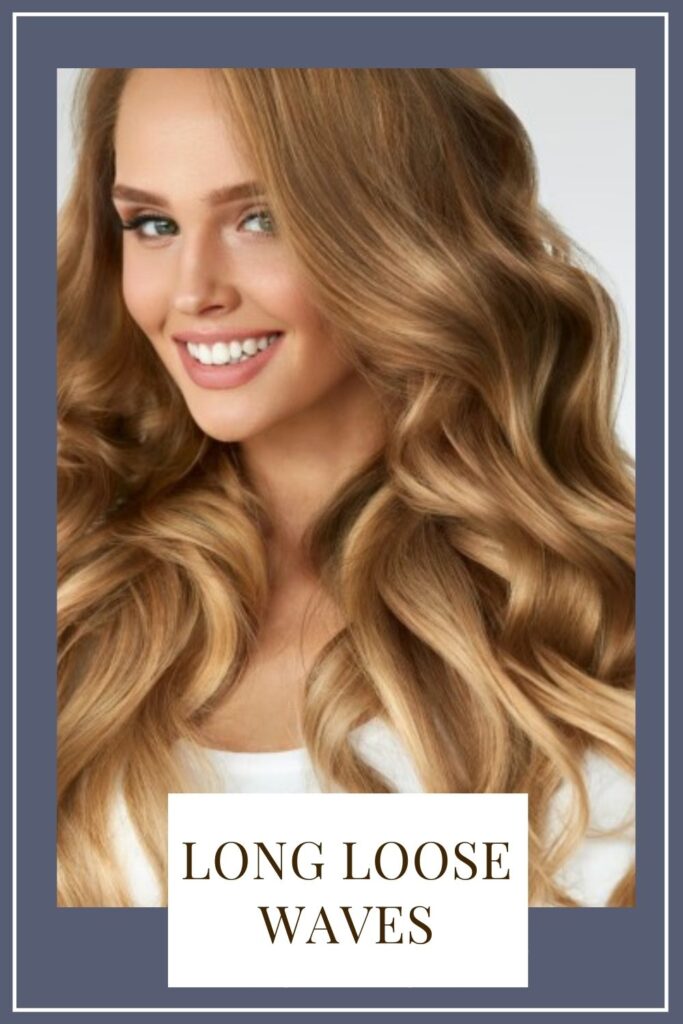A smiling girl in white top showing her Long loose waves hairstyle A smiling girl in white top showing her Long loose waves hairstyle - Oblong face shape