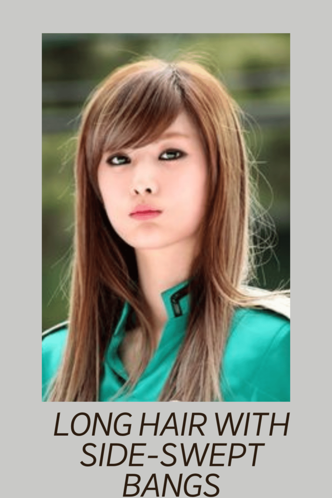A girl in green dress and Long Hair with Side-Swept Bangs hairstyle - face shape