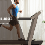 A man walking on a treadmill desk