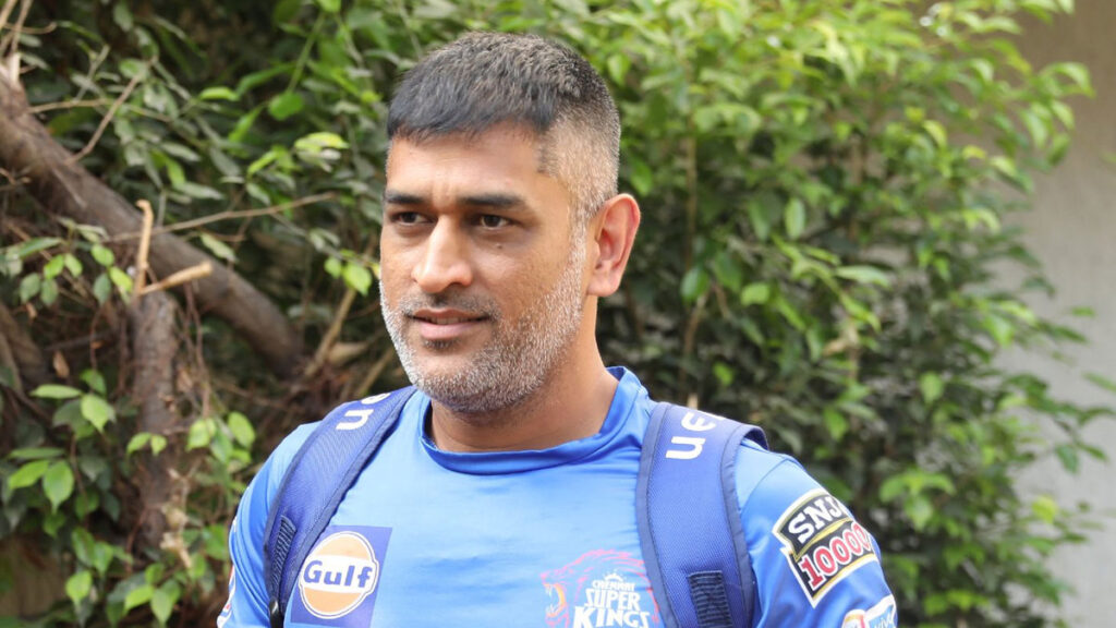 MS Dhoni carrying a bag and showing his Crew Cut hairstyles with beard - MS Dhoni hairstyle 2022