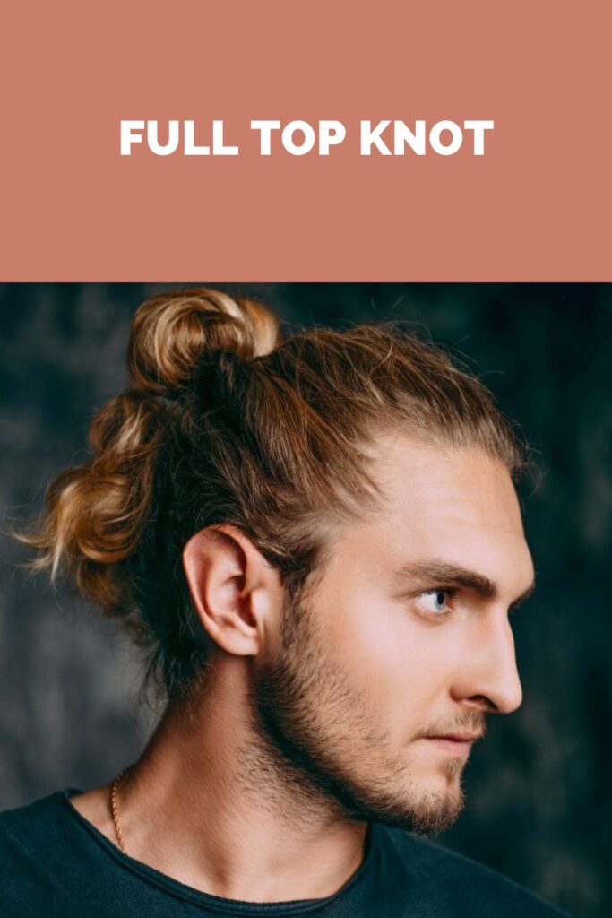 A man in black round neck t-shirt showing the side of his Full Top Knot hairstyle - hairstyles for men long hair