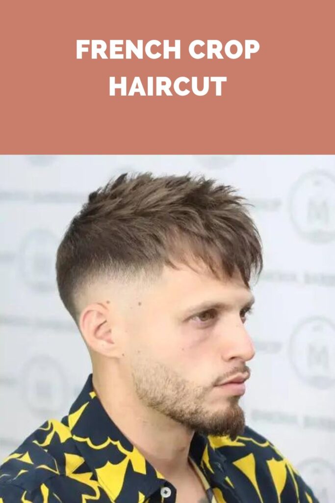 A man in black and yellow printed shirt posing for camera and showing his french crop haircut - hairstyles for men 2022