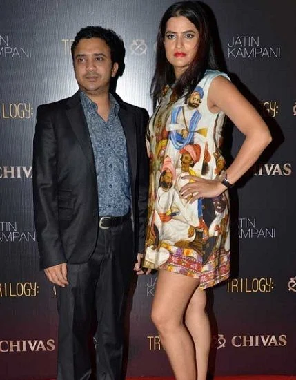 Sona Mahapatra in multi color dress with husband Ram Sampath in blue suit - Indian singer spouse