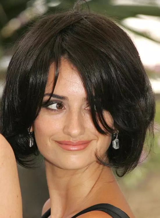 Smiling Penelope Cruz in blue tank top with stone earrings and Straight Hair - hairstyles of hollywood actresses