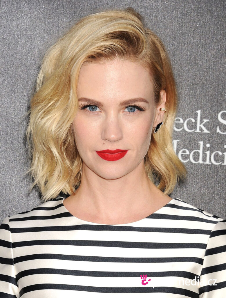 January Jones in black and white lining dress with red lipstick posing for camera and showing her classic Retro Look - Best Hollywood hairstyles