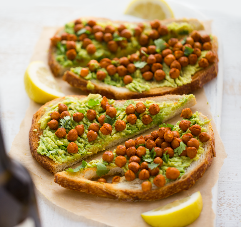 Smashed Chickpea and Avocado Toast serving with chickpeas toppings - breakfast ideas for muscle gain and body building