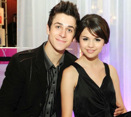 Selena Gomez and David Henrie in black matching outfit posing for camera - selena gomez short hair