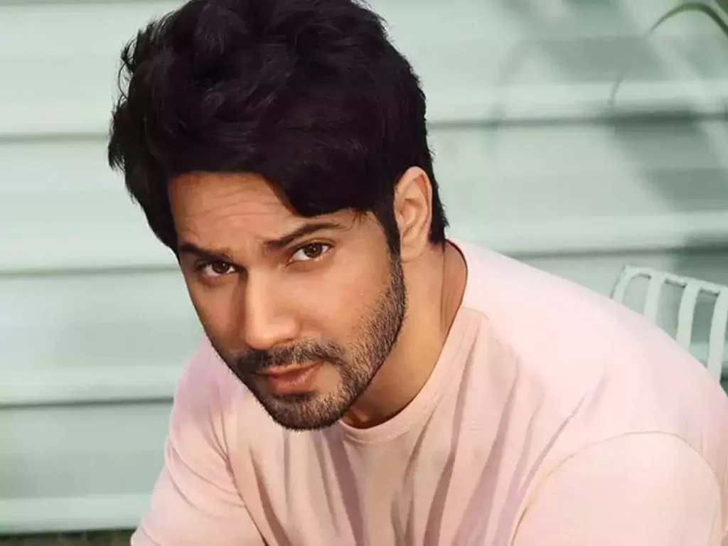 Varun Dhawan in pink round neck t-shirt - Indian actors hairstyles