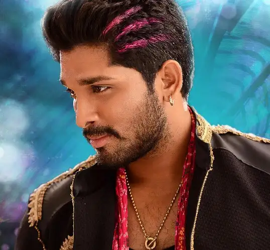 Allu Arjun in black jacket posing for camera and showing his colored hair - hair cutting Allu Arjun
