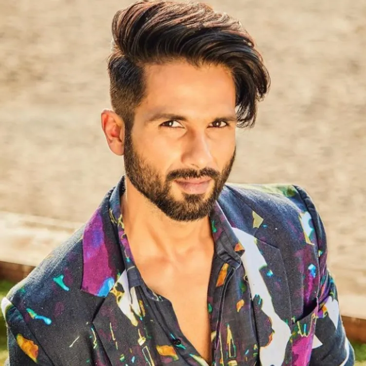 Shahid Kapoor in multicolor coat and shirt posing for camera - bollywood actors latest hairstyles 2022