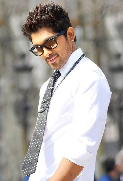 Allu Arjun in white shirt blue tie and googles posing for camera - Allu Arjun hairstyle photos