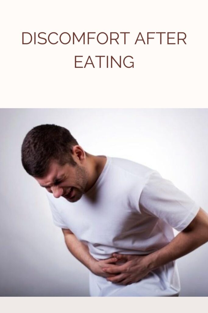 A man in grey t-shirt suffering from stomachache  - Discomfort After Eating
