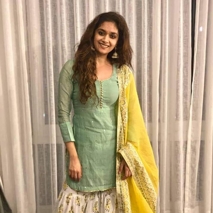 Keerthi Suresh in light green kurta with yellow dupatta posing for a no make up pic - no 1 actress in south india