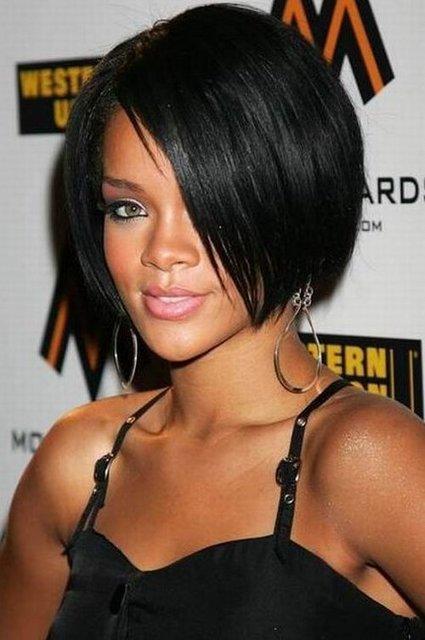 Rihanna in black strappy dress and hoops earing - short hair hollywood celebrities