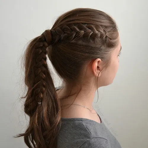 A girl in grey t-shirt showing the side view of her Braided Ponytail - hairstyles for girls braids