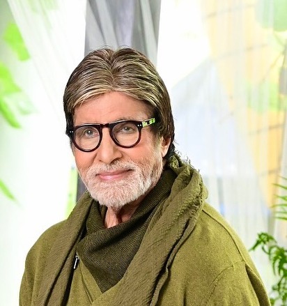 Amitabh Bachchan in green high neck jacket and spectacles - indian celebrities having diabetes 