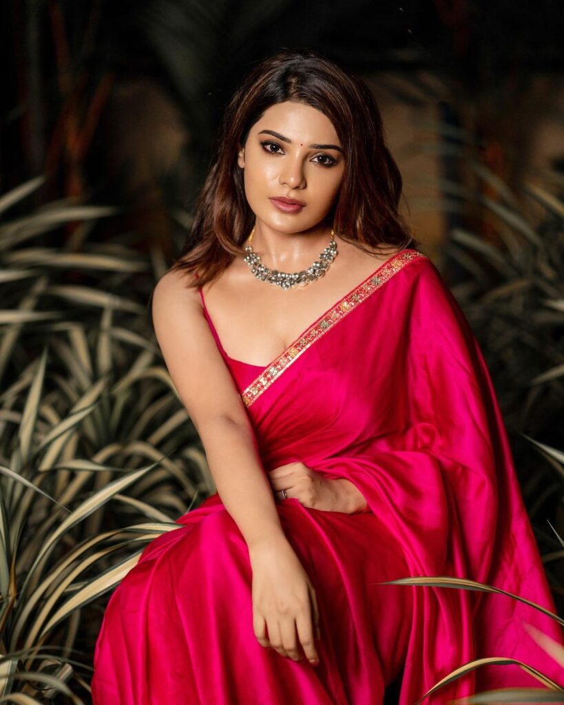 Aathmika in pink saree with strappy blouse and necklace posing for camera - beautiful indian girl instagram photos