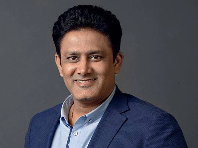 Smiling Anil Kumble in dark blue coat with light blue shirt - indian celebrities with diabetes type 2