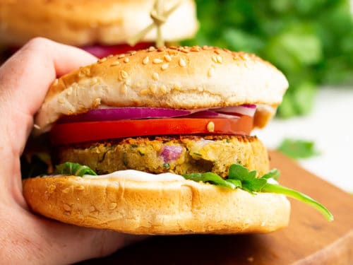 Tangy Chickpea Burger with onion, tomato and coriander leaves - High protein vegetarian meals