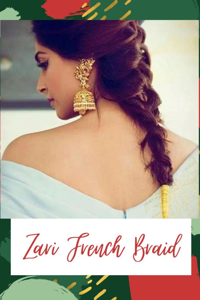 A girl in deep neck sky blue dress and jhumka earrings posing for camera and showing the back view of her zari french braid - Haircuts for Indian Women