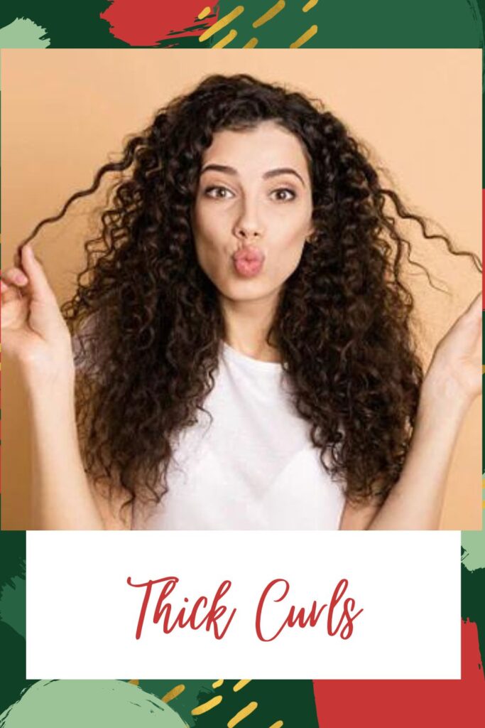 A girl in white t-shirt posing for camera and showing her Thick Curls - Indian hairstyles for women