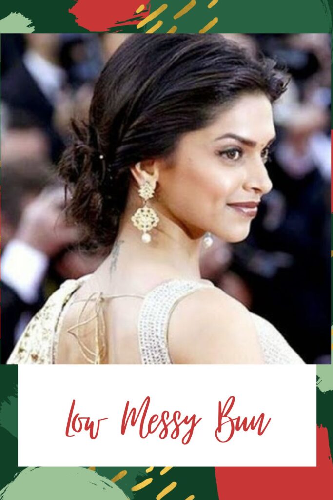 A girl in white and golden saree with cut sleeves blouse posing for camera and showing the side view of her low messy bun A girl in white and golden saree with cut sleeves blouse posing for camera and showing the side view of her low messy bun - Hairstyles for Indian Women