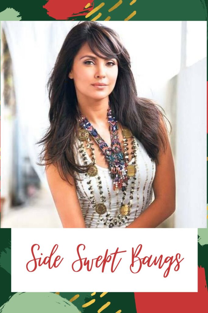 A girl in white tank top with multiple necklaces posing for camera and showing her Side Swept Bangs A girl in white tank top with multiple necklaces posing for camera and showing her Side Swept Bangs - Hairstyles for Indian Women